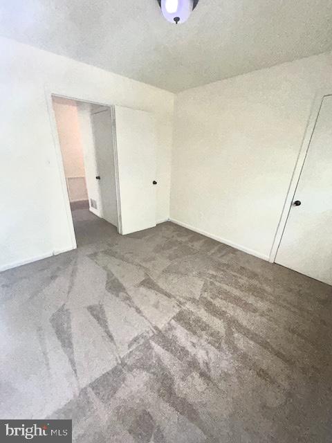 136 Charles Pl, Indian Head, MD 20640 - unfurnished bedroom featuring baseboards and a closet