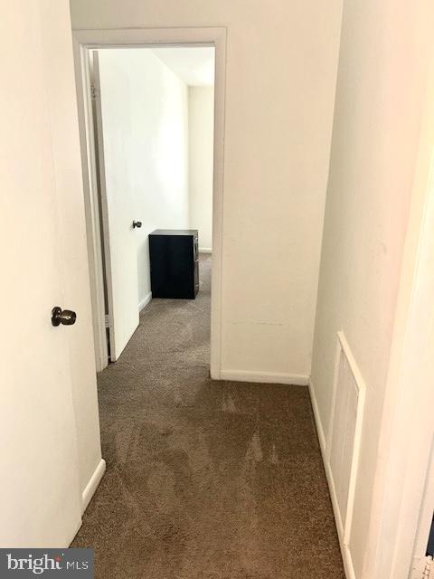 136 Charles Pl, Indian Head, MD 20640 - corridor featuring baseboards, visible vents, and carpet