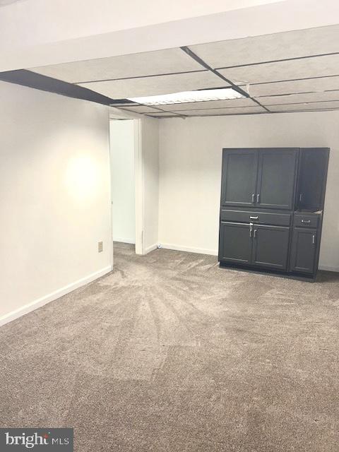 136 Charles Pl, Indian Head, MD 20640 - below grade area with baseboards and carpet flooring