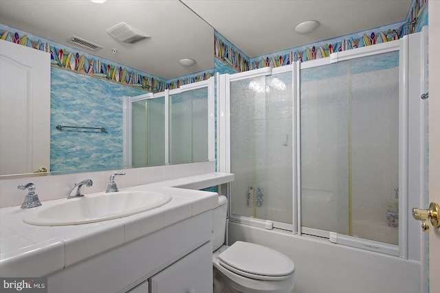 12201 Wight St Unit 301, Ocean City, MD 21842 - bathroom with visible vents, toilet, shower / bath combination with glass door, and vanity