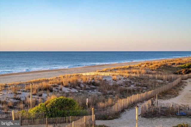 12201 Wight St Unit 301, Ocean City, MD 21842 - water view featuring fence and a beach view