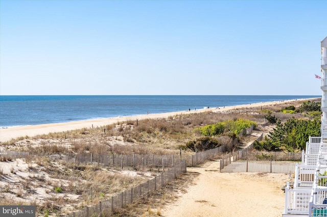 12201 Wight St Unit 301, Ocean City, MD 21842 - property view of water featuring a beach view and fence