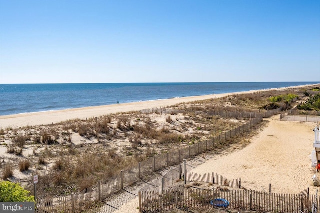 12201 Wight St Unit 301, Ocean City, MD 21842 - property view of water featuring fence and a view of the beach
