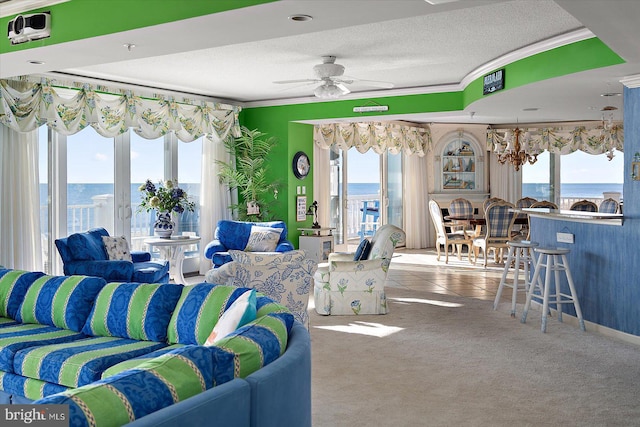 12201 Wight St Unit 301, Ocean City, MD 21842 - living area with a textured ceiling, a healthy amount of sunlight, crown molding, and a water view