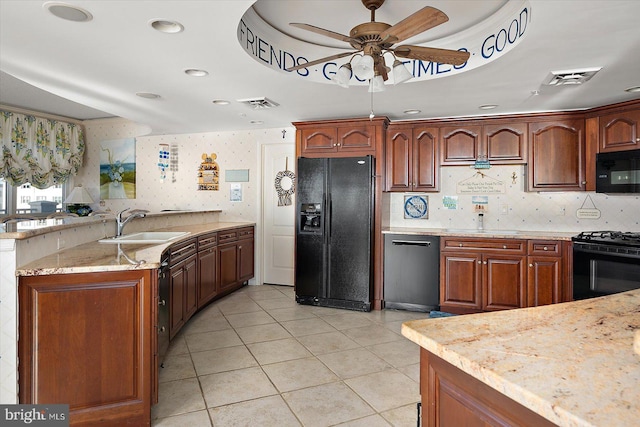 12201 Wight St Unit 301, Ocean City, MD 21842 - kitchen featuring a sink, light tile patterned floors, ceiling fan, black appliances, and visible vents