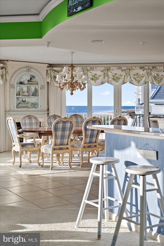 12201 Wight St Unit 301, Ocean City, MD 21842 - dining area with crown molding, a notable chandelier, and a water view