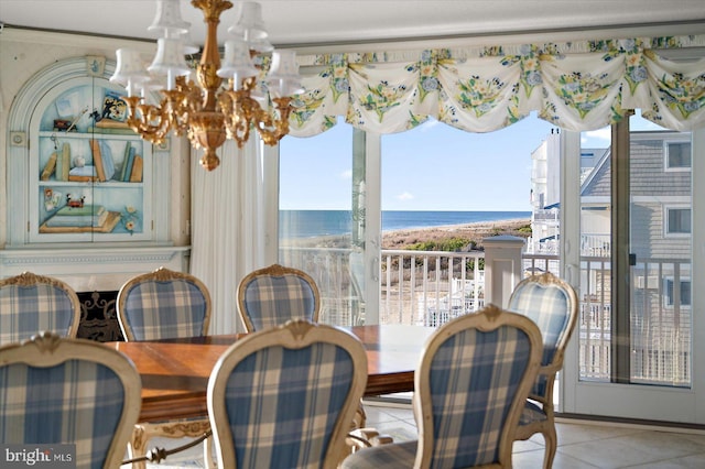 12201 Wight St Unit 301, Ocean City, MD 21842 - dining space with tile patterned floors, a chandelier, and a water view