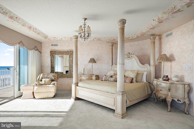 12201 Wight St Unit 301, Ocean City, MD 21842 - carpeted bedroom with visible vents, wallpapered walls, access to outside, and ornate columns