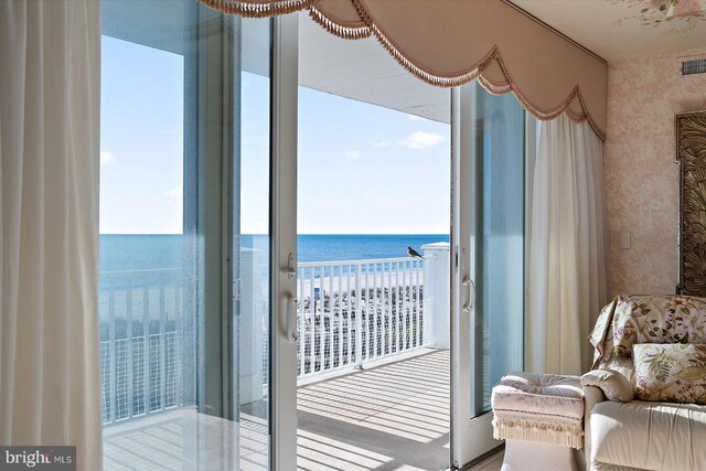 12201 Wight St Unit 301, Ocean City, MD 21842 - balcony featuring a water view and a view of the beach