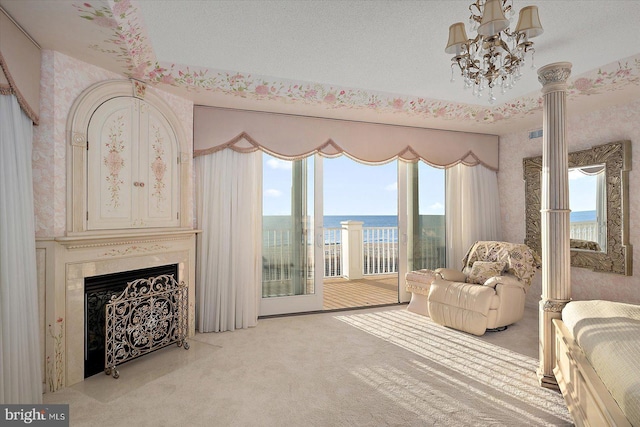 12201 Wight St Unit 301, Ocean City, MD 21842 - interior space featuring a fireplace, a notable chandelier, a water view, and carpet floors