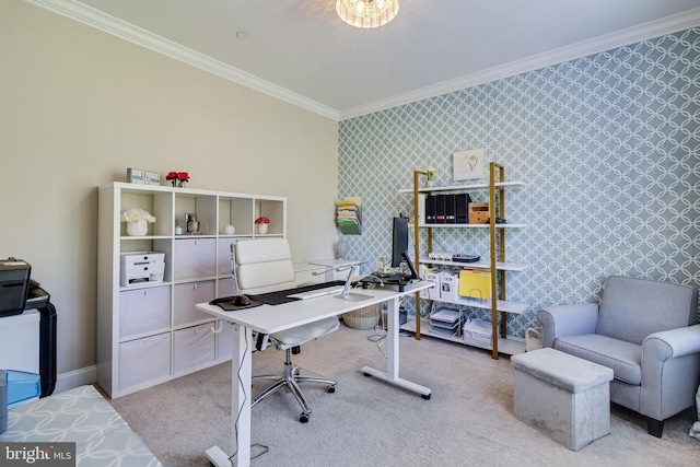 carpeted home office with crown molding, baseboards, and wallpapered walls