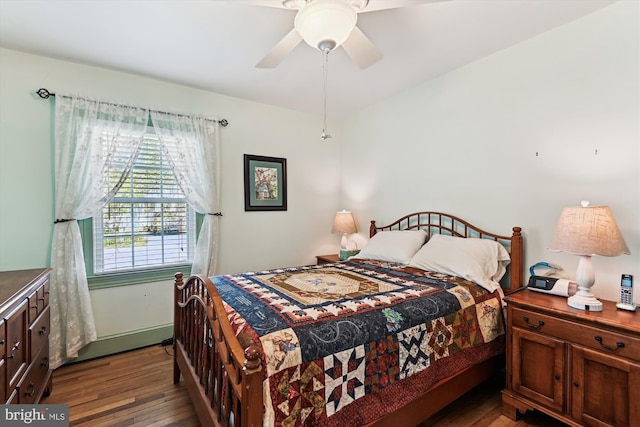 5211 Al Jones Dr, Shady Side, MD 20764 - bedroom with ceiling fan and dark wood-style flooring