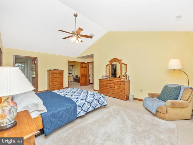 carpeted bedroom featuring baseboards, lofted ceiling, ceiling fan, and visible vents