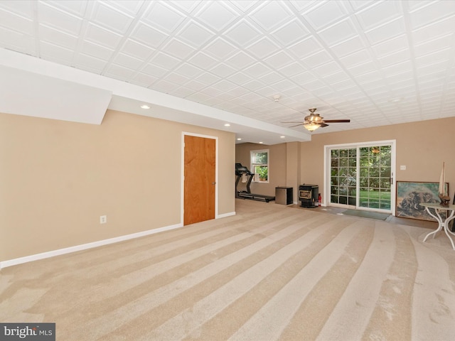 unfurnished living room with baseboards, carpet flooring, recessed lighting, and a ceiling fan