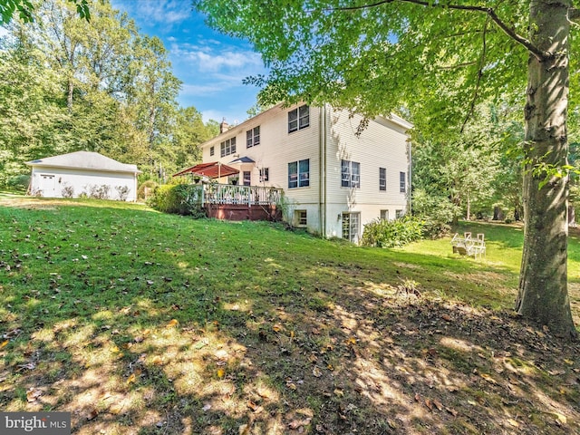 view of yard featuring a wooden deck
