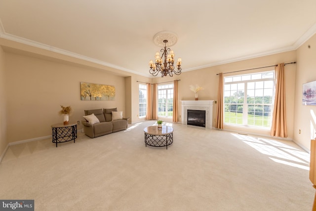 carpeted living area with crown molding, a chandelier, plenty of natural light, baseboards, and a premium fireplace