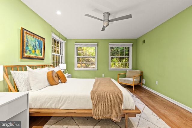2646 S June St, Arlington, VA 22202 - bedroom with wood finished floors, baseboards, recessed lighting, and ceiling fan