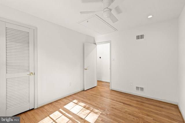 2646 S June St, Arlington, VA 22202 - unfurnished bedroom featuring wood finished floors, baseboards, recessed lighting, a ceiling fan, and attic access