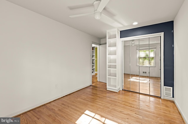 2646 S June St, Arlington, VA 22202 - unfurnished bedroom featuring light wood-style floors, a closet, recessed lighting, ceiling fan, and baseboards