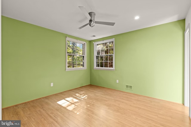 2646 S June St, Arlington, VA 22202 - spare room featuring wood finished floors and a ceiling fan