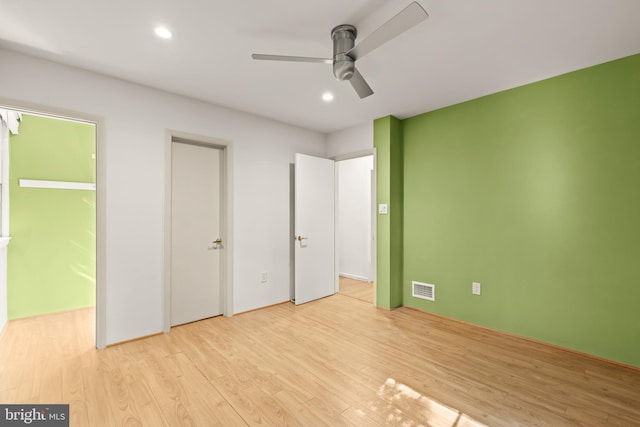 2646 S June St, Arlington, VA 22202 - unfurnished bedroom with wood finished floors, recessed lighting, and a ceiling fan