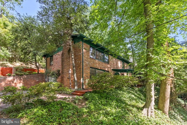 2646 S June St, Arlington, VA 22202 - view of home's exterior featuring brick siding