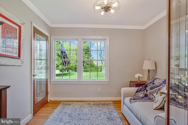2801 Riva Rd, Annapolis, MD 21401 - sitting room featuring light wood-style flooring, baseboards, an inviting chandelier, and crown molding