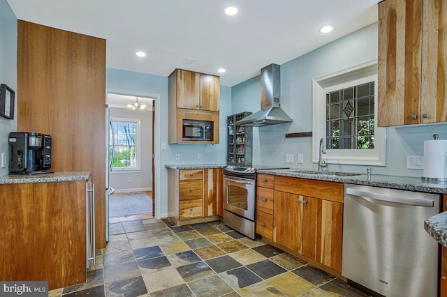 2801 Riva Rd, Annapolis, MD 21401 - kitchen featuring stone tile flooring, a sink, light stone counters, wall chimney range hood, and appliances with stainless steel finishes