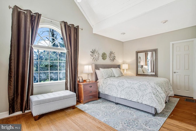 2801 Riva Rd, Annapolis, MD 21401 - bedroom featuring lofted ceiling, wood finished floors, and visible vents