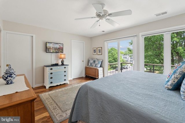 15 Chesapeake Lndg, Annapolis, MD 21403 - bedroom featuring access to outside, wood finished floors, a ceiling fan, and baseboards
