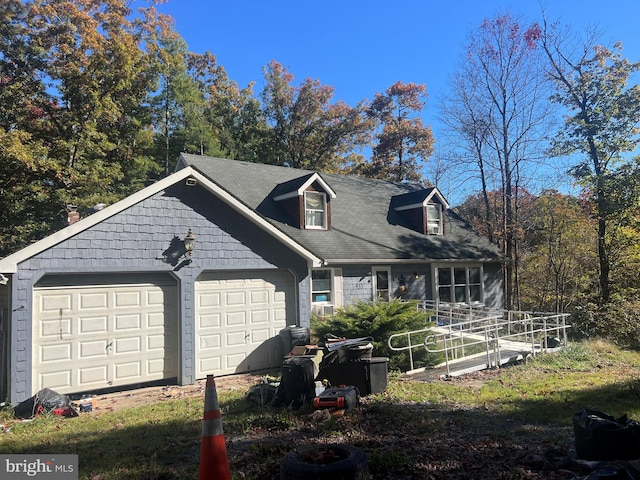 view of side of property with a garage