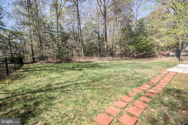 view of yard featuring a fenced backyard