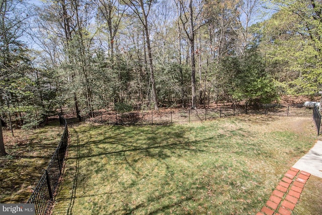 view of yard with a fenced backyard