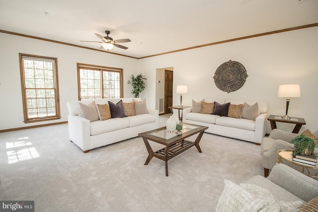 carpeted living area featuring crown molding, visible vents, baseboards, and a ceiling fan