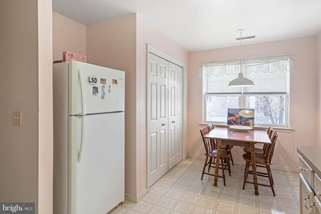 30381 Crowley Dr Unit 309, Ocean View, DE 19970 - dining room featuring baseboards, visible vents, and light floors