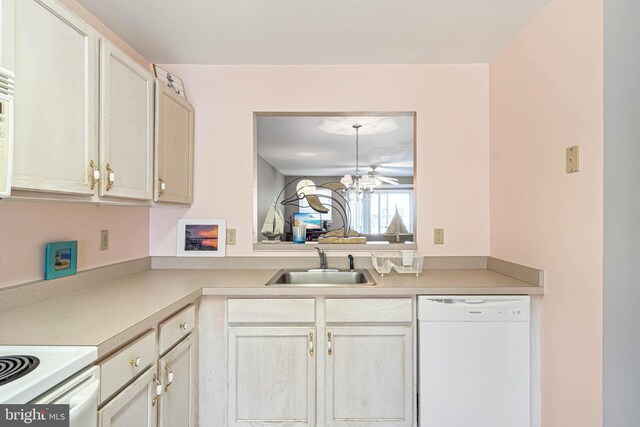 30381 Crowley Dr Unit 309, Ocean View, DE 19970 - kitchen with a sink, light countertops, and white dishwasher