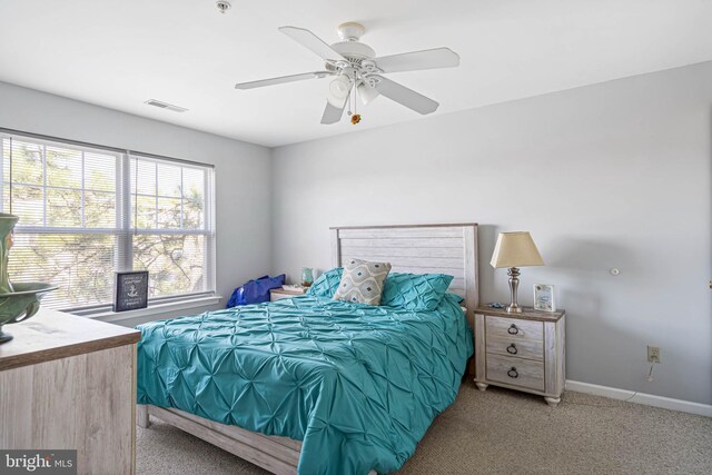 30381 Crowley Dr Unit 309, Ocean View, DE 19970 - carpeted bedroom featuring baseboards, visible vents, and a ceiling fan