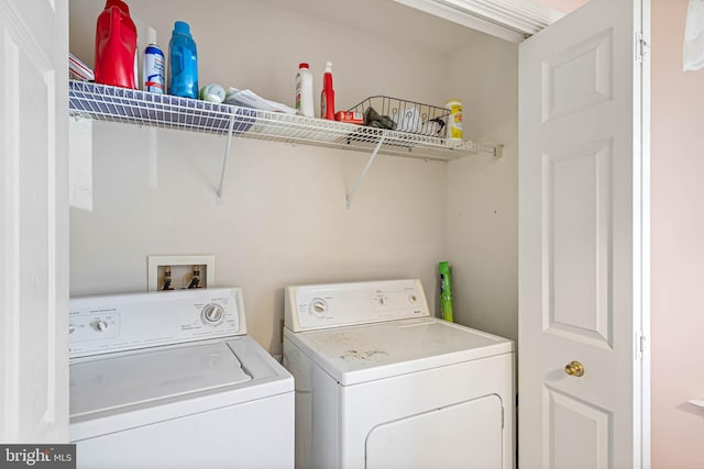 30381 Crowley Dr Unit 309, Ocean View, DE 19970 - laundry room featuring washer and dryer and laundry area