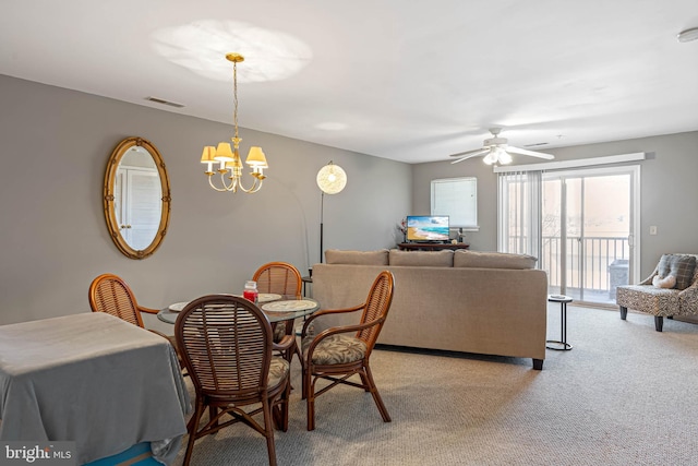 30381 Crowley Dr Unit 309, Ocean View, DE 19970 - dining room featuring light carpet, ceiling fan with notable chandelier, and visible vents