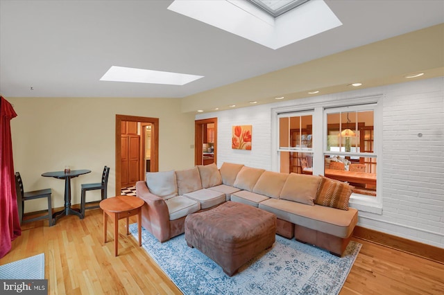 157 Hartswick Ave, State College, PA 16803 - living area with recessed lighting, baseboards, wood finished floors, and a skylight