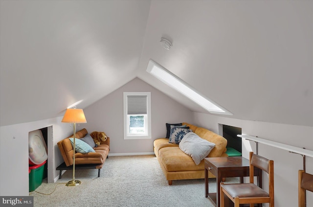 157 Hartswick Ave, State College, PA 16803 - sitting room with carpet flooring, vaulted ceiling with skylight, and baseboards