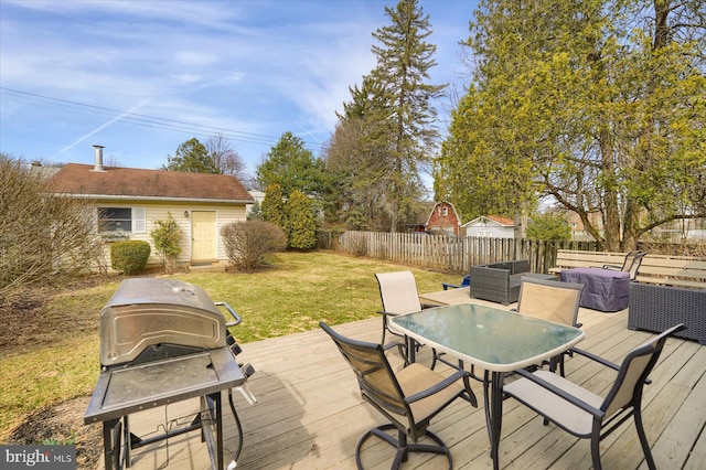 157 Hartswick Ave, State College, PA 16803 - wooden deck featuring fence, outdoor dining area, a yard, an outdoor structure, and a grill