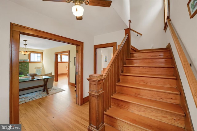 157 Hartswick Ave, State College, PA 16803 - stairs with baseboards, a ceiling fan, and wood finished floors
