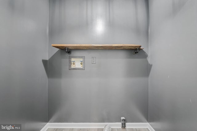 246 Locust Ln, Edinburg, VA 22824 - laundry room featuring baseboards, hookup for a washing machine, laundry area, and wood finished floors