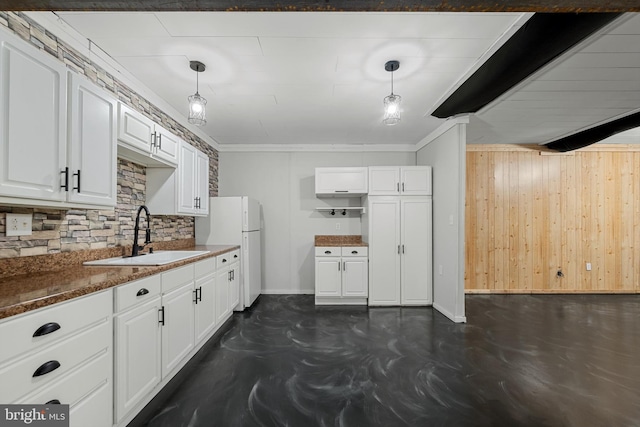 246 Locust Ln, Edinburg, VA 22824 - kitchen with a sink, backsplash, white cabinetry, and baseboards