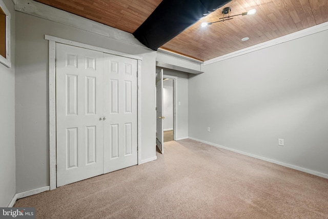 246 Locust Ln, Edinburg, VA 22824 - unfurnished bedroom with baseboards, carpet flooring, a closet, and wooden ceiling