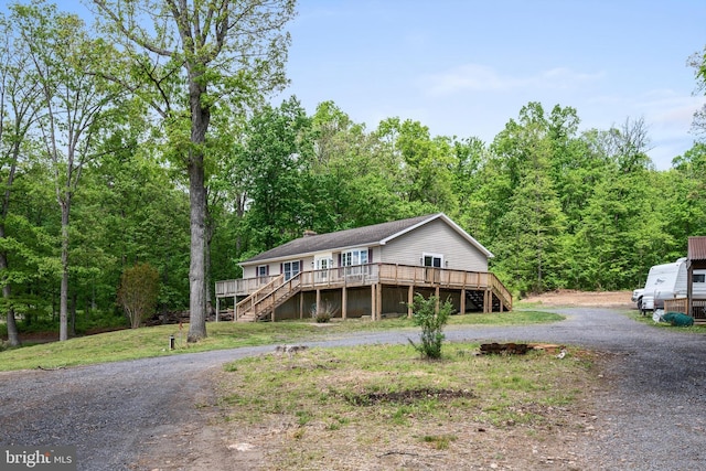 246 Locust Ln, Edinburg, VA 22824 - view of front of property featuring a chimney, stairs, a view of trees, and driveway
