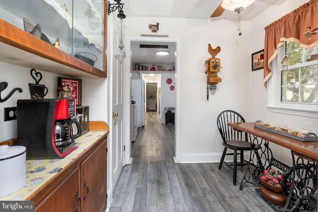 26547 Old State Rd, Crisfield, MD 21817 - corridor with dark wood finished floors and baseboards