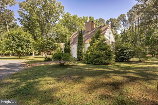 26547 Old State Rd, Crisfield, MD 21817 - view of home's exterior with a yard and a chimney