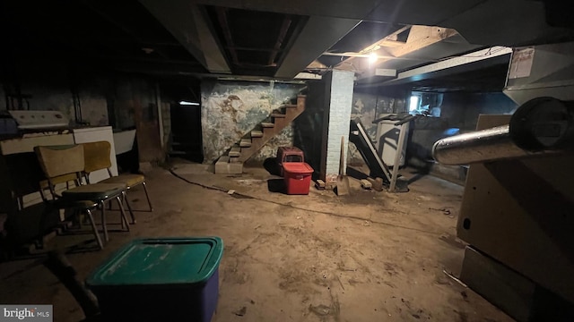 unfinished basement with stairs